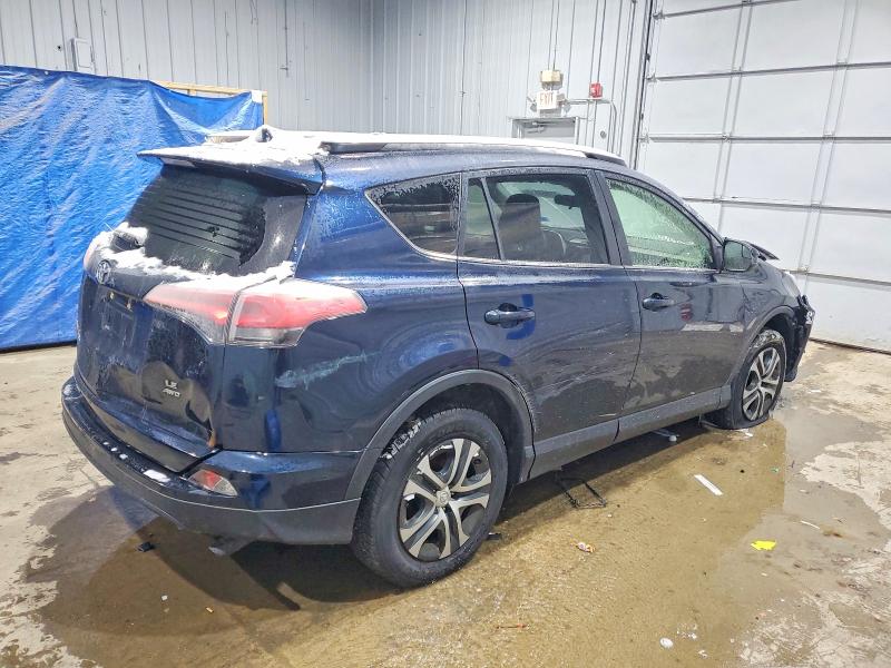 Photo 3 from auction – 2017 TOYOTA RAV4 with VIN JTMBFREV1HJ704021