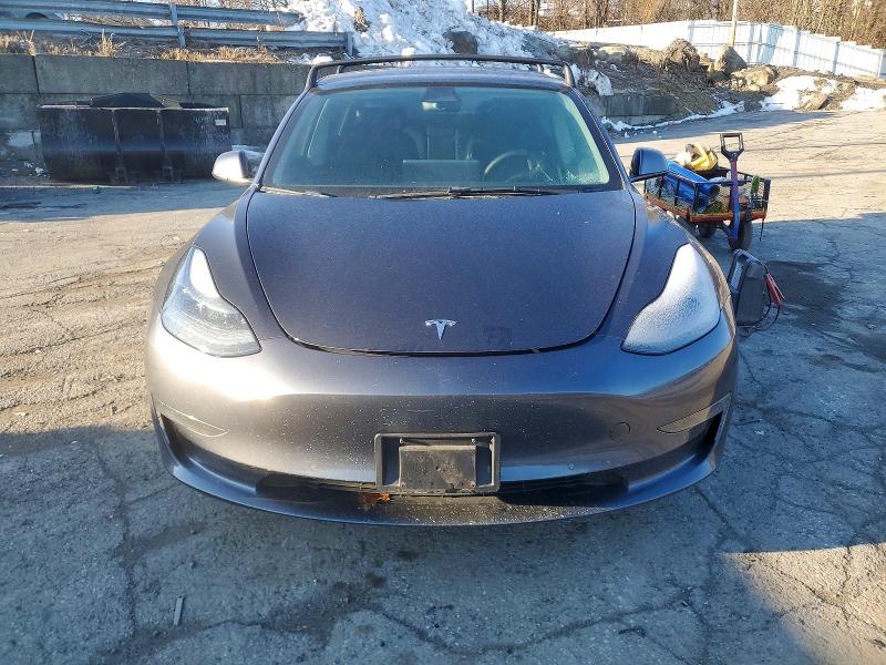Photo 5 from auction – 2021 TESLA MODEL 3 with VIN 5YJ3E1EA9MF099673
