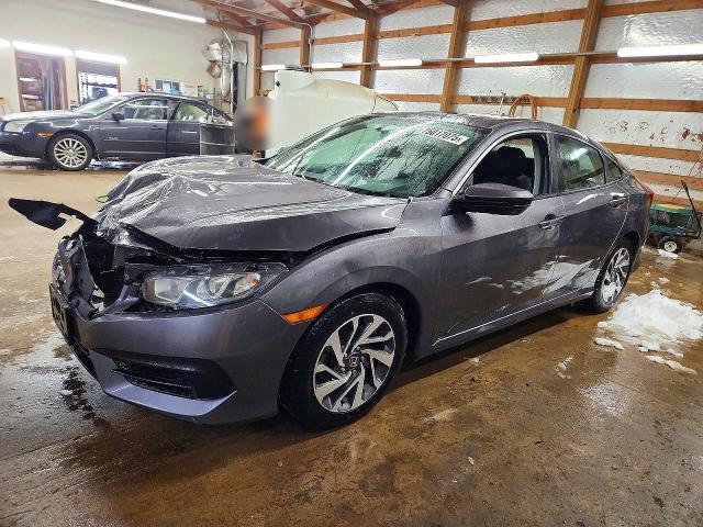 HONDA CIVIC EX 2018 with VIN 2HGFC2F79JH593048 - Photo from auction