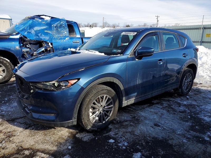 MAZDA CX-5 2018 with VIN JM3KFBBM1J0372037 - Photo from auction