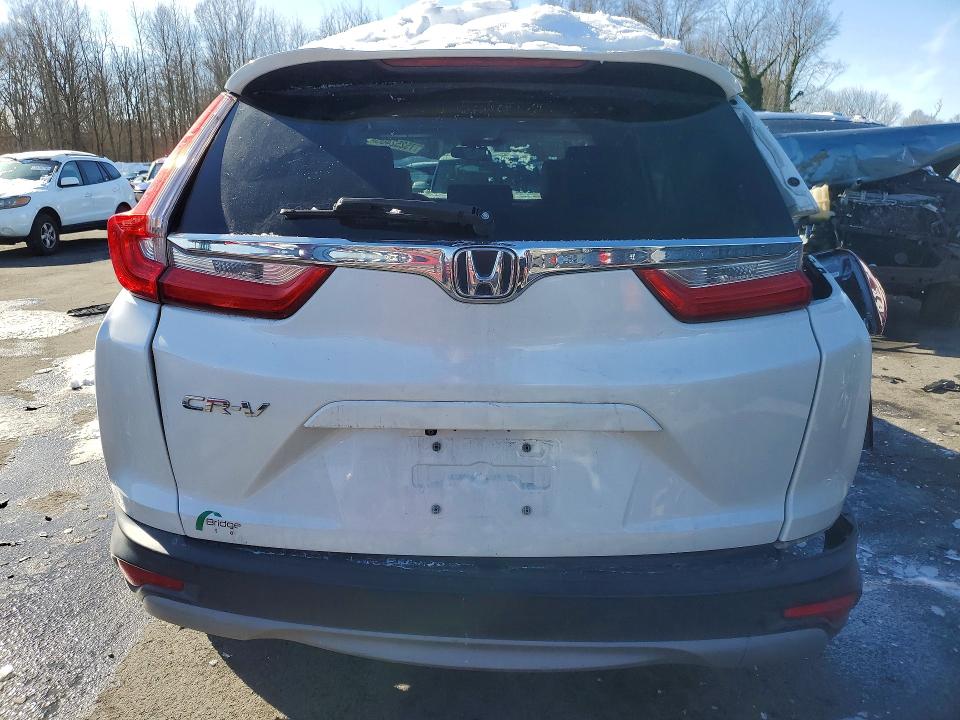 Photo 6 from auction – 2018 HONDA CR-V with VIN 2HKRW1H52JH502010