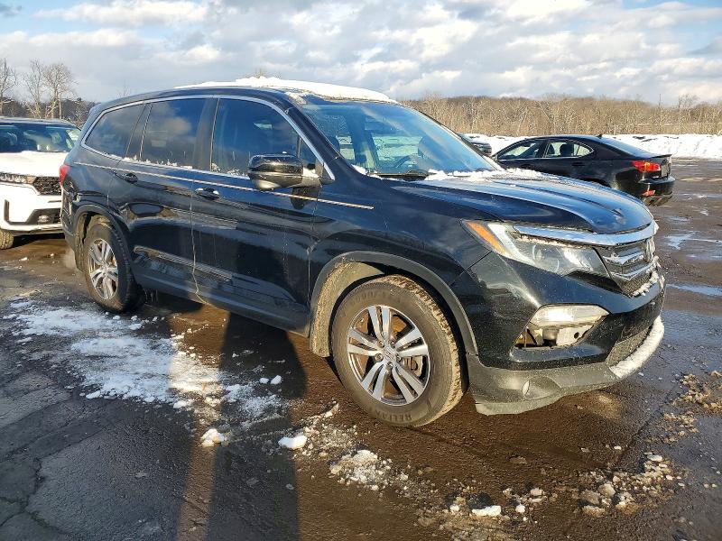 Photo 4 from auction – 2018 HONDA PILOT EXLN with VIN 5FNYF6H71JB009461