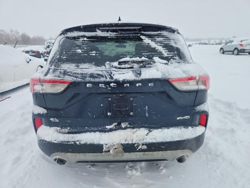 Photo 6 from auction – 2021 FORD ESCAPE with VIN 1FMCU9G61MUA07582