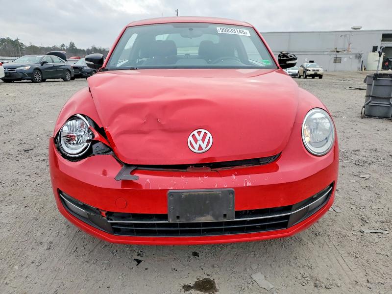 Photo 5 from auction – 2012 VOLKSWAGEN BEETLE TUR with VIN 3VWVA7AT2CM655330