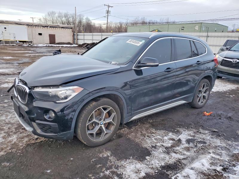 BMW X1 XDRIVE2 2018 with VIN WBXHT3C38J5L27965 - Photo from auction