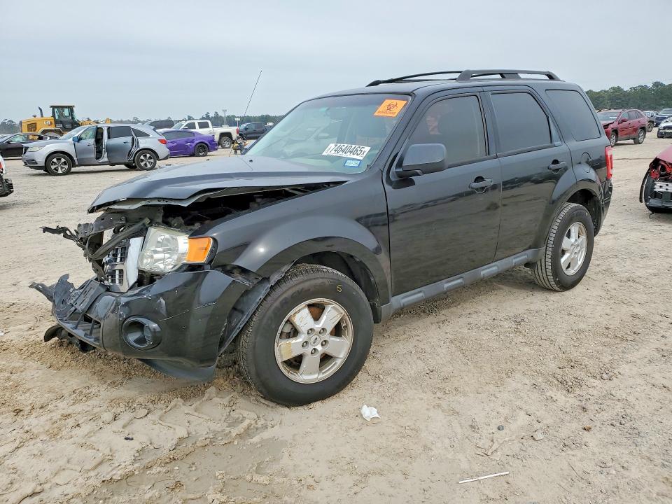 FORD ESCAPE 2011 with VIN 1FMCU0C78BKA07209 - Photo from auction