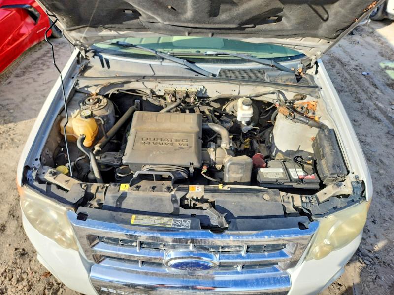 Photo 12 from auction – 2009 FORD ESCAPE with VIN 1FMCU04G39KA79475