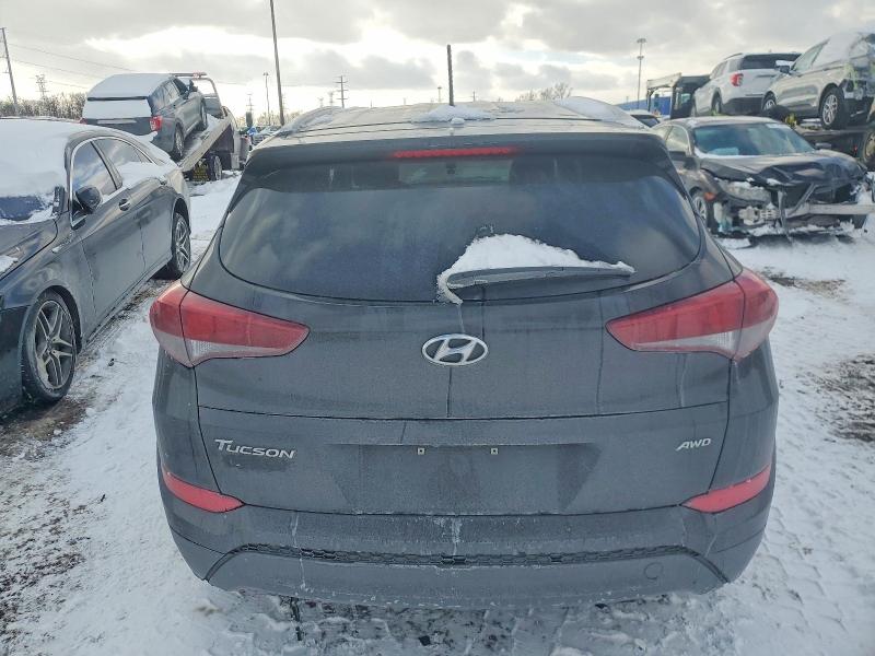 Photo 6 from auction – 2017 HYUNDAI TUCSON LIM with VIN KM8J3CA45HU540412