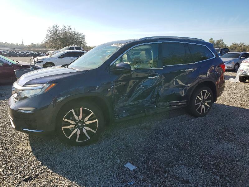 HONDA PILOT ELIT 2022 with VIN 5FNYF6H09NB029076 - Photo from auction