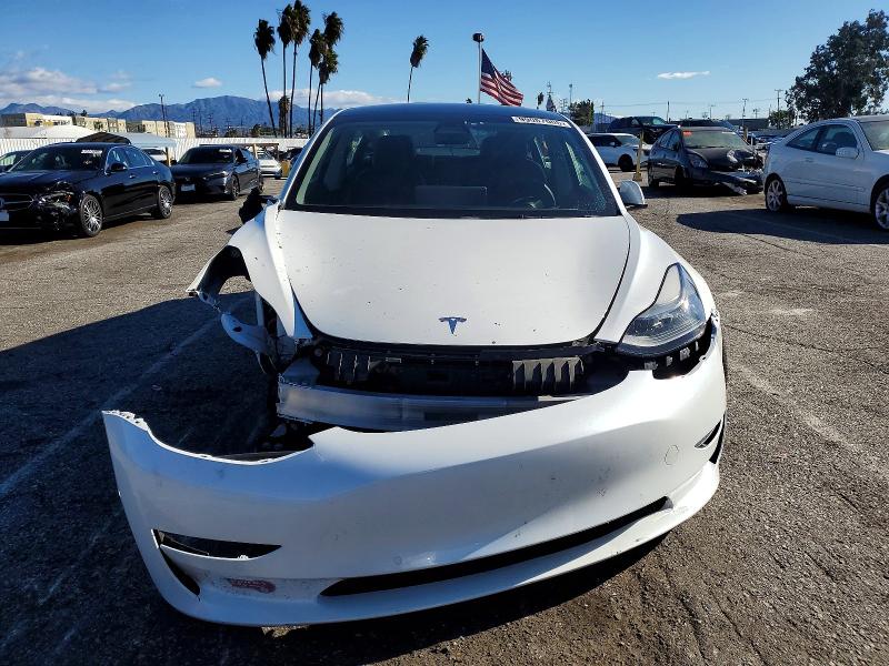 Photo 5 from auction – 2022 TESLA MODEL 3 with VIN 5YJ3E1EB5NF133084
