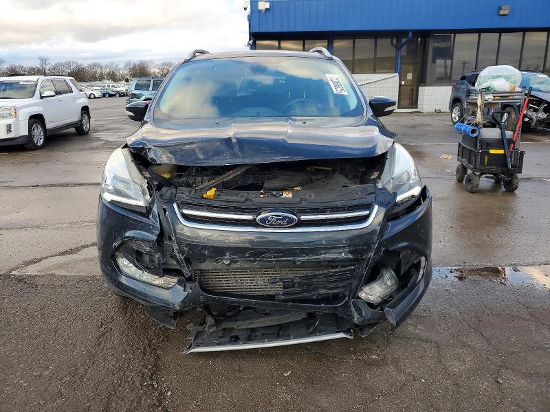 Photo 5 from auction – 2014 FORD ESCAPE with VIN 1FMCU9J93EUA98679