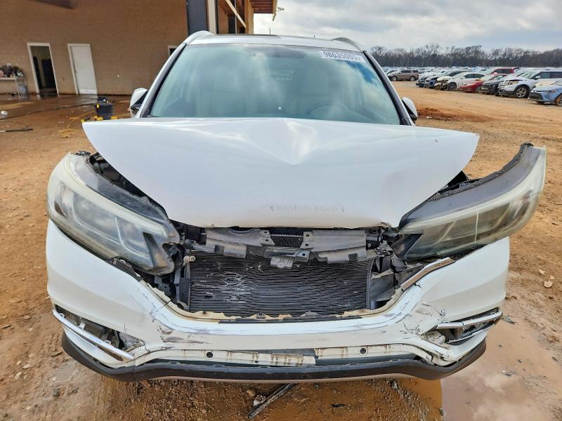 Photo 5 from auction – 2015 HONDA CR-V EXL with VIN 5J6RM3H74FL006660