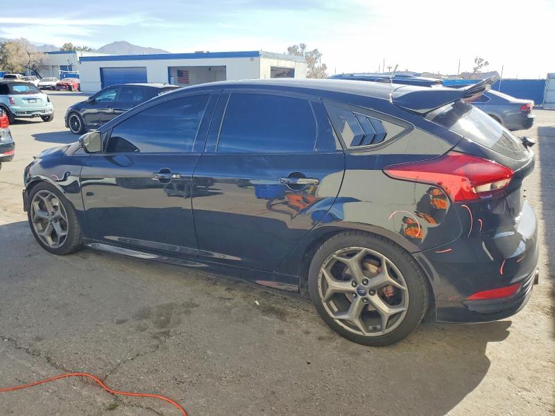 Photo 2 from auction – 2015 FORD FOCUS with VIN 1FADP3L98FL261060