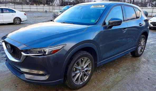 MAZDA CX-5 2020 with VIN JM3KFADM0L0823081 - Photo from auction