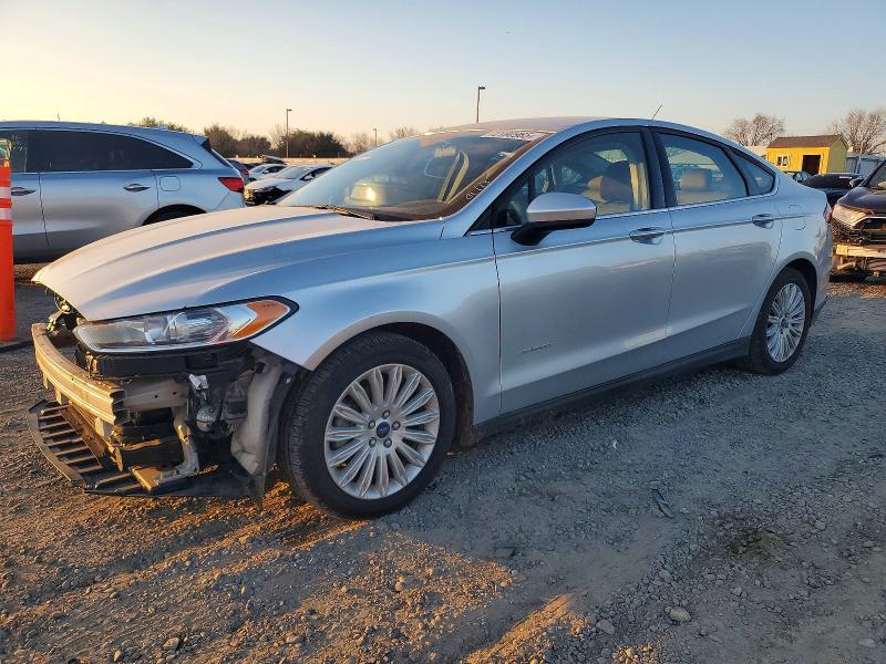 FORD FUSION S H 2016 with VIN 3FA6P0UU3GR386626 - Photo from auction