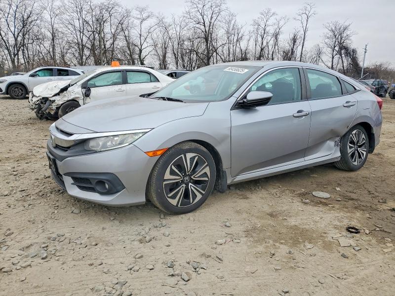 HONDA CIVIC EX 2016 with VIN 19XFC1F32GE222890 - Photo from auction