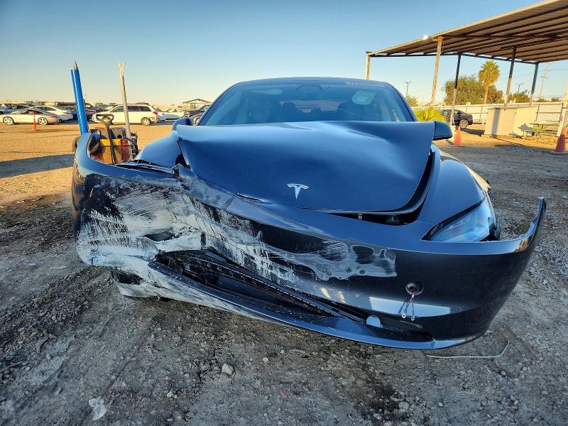 Photo 5 from auction – 2025 TESLA MODEL 3 with VIN 5YJ3E1EA8SF875577