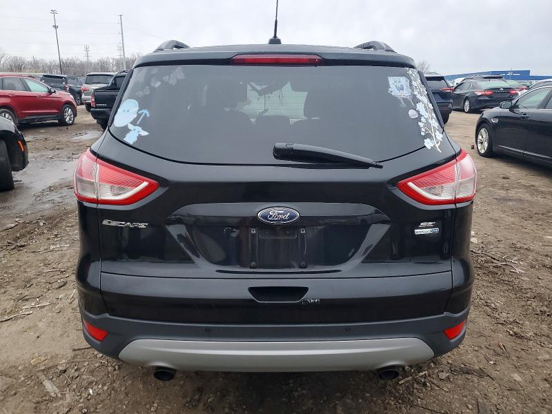 Photo 6 from auction – 2016 FORD ESCAPE SE with VIN 1FMCU9GX8GUA96497