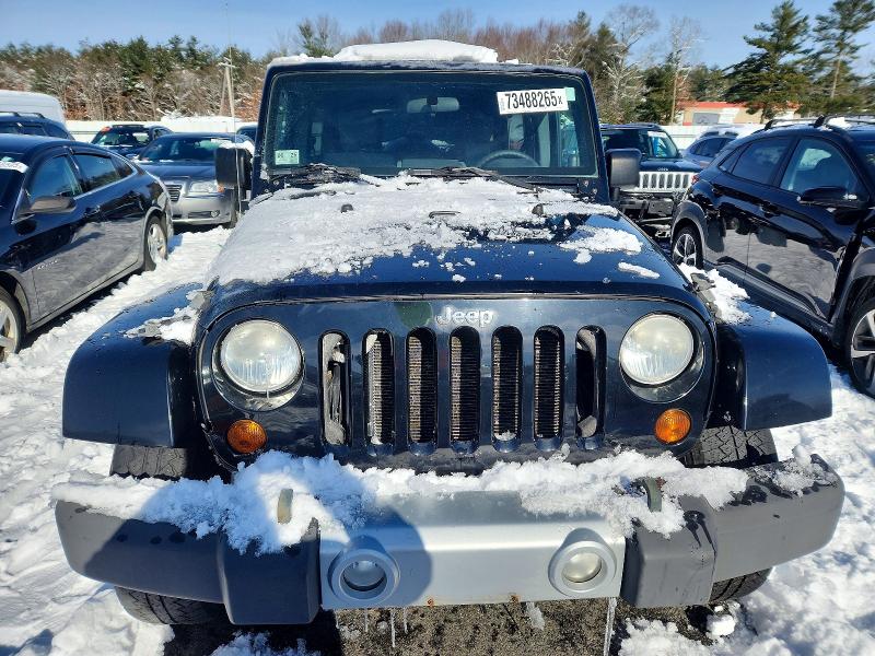 Photo 5 from auction – 2010 JEEP WRANGLER U with VIN 1J4BA5H16AL104843