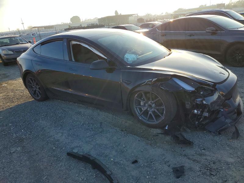 Photo 4 from auction – 2023 TESLA MODEL 3 with VIN 5YJ3E1EA4PF599504