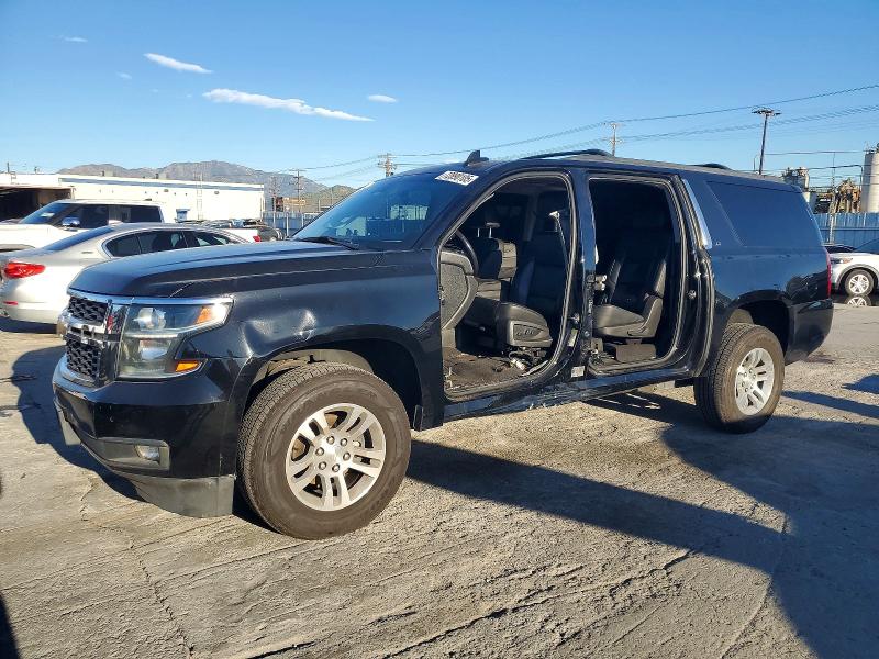 CHEVROLET SUBURBAN 2019 with VIN 1GNSCHKC0KR360994 - Photo from auction
