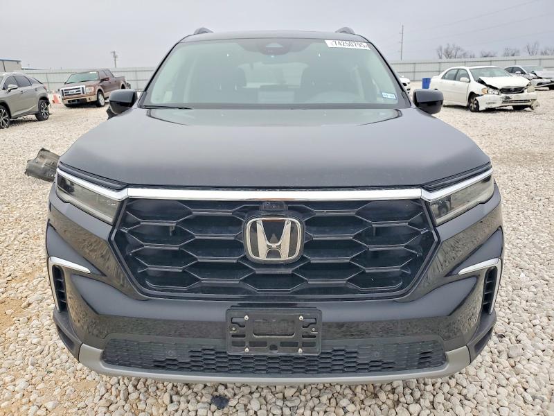 Photo 5 from auction – 2023 HONDA PILOT ELIT with VIN 5FNYG1H89PB017115