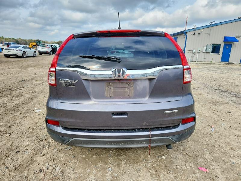 Photo 6 from auction – 2016 HONDA CR-V SE with VIN 2HKRM3H48GH523140