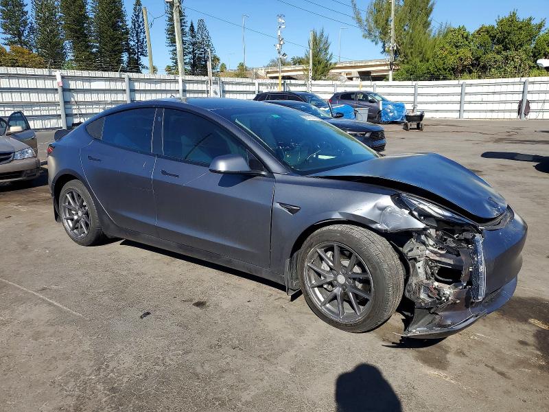 Photo 4 from auction – 2022 TESLA MODEL 3 with VIN 5YJ3E1EB8NF102315