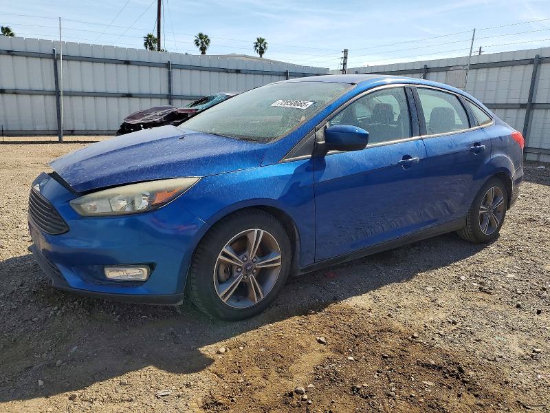 FORD FOCUS SE 2018 with VIN 1FADP3F26JL302535 - Photo from auction