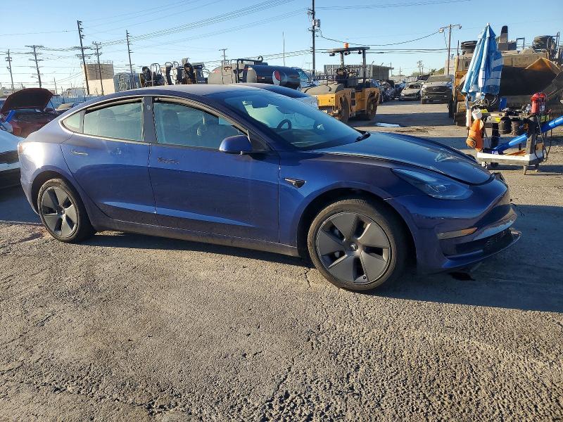 Photo 4 from auction – 2023 TESLA MODEL 3 with VIN 5YJ3E1EA9PF473610