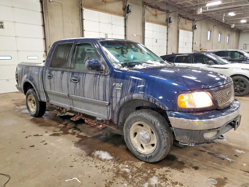 Photo 4 from auction – 2003 FORD F150 SUPER with VIN 1FTRW08L03KB61218