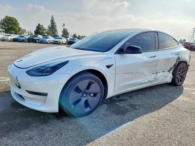 TESLA MODEL 3 2023 with VIN 5YJ3E1EAXPF409351 - Photo from auction
