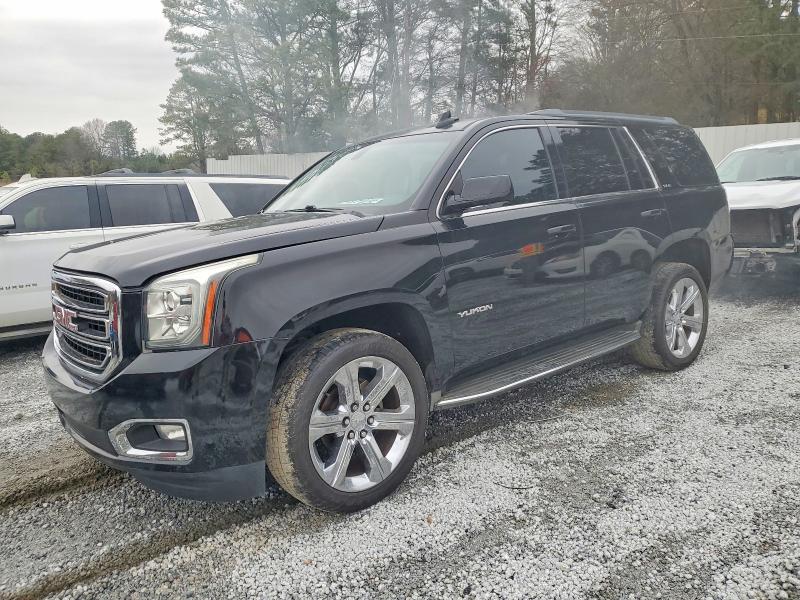 GMC YUKON SLE 2016 with VIN 1GKS1AKC4GR336215 - Photo from auction