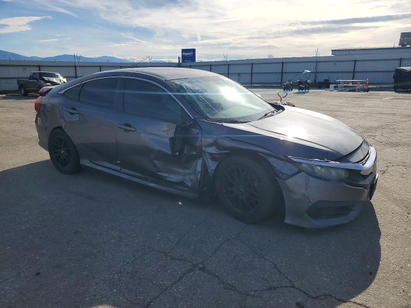 Photo 4 from auction – 2016 HONDA CIVIC LX with VIN 2HGFC2F51GH514480
