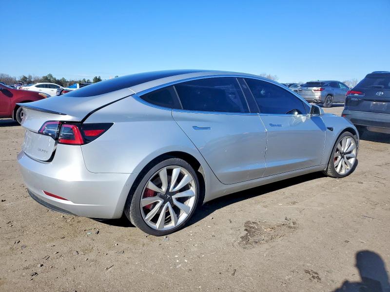 Photo 3 from auction – 2018 TESLA MODEL 3 with VIN 5YJ3E1EBXJF083423