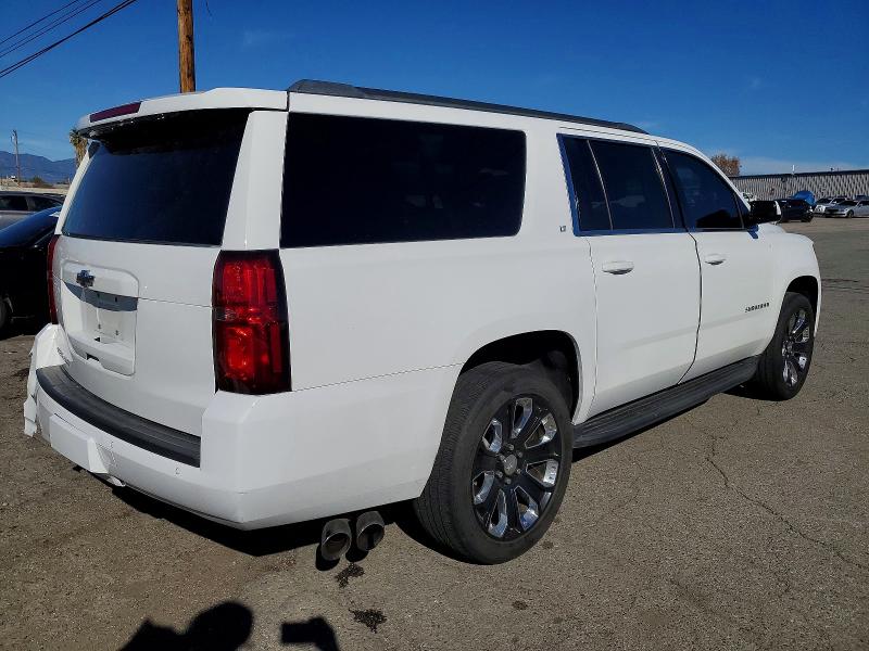 Photo 3 from auction – 2019 CHEVROLET SUBURBAN with VIN 1GNSCHKC4KR188811