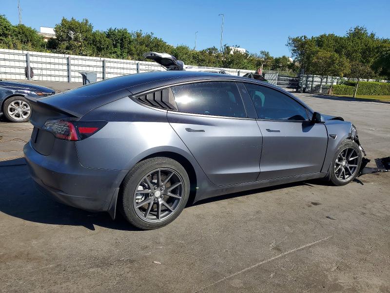 Photo 3 from auction – 2022 TESLA MODEL 3 with VIN 5YJ3E1EB8NF102315