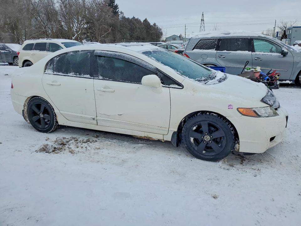 Photo 4 from auction – 2011 HONDA CIVIC LX-S with VIN 2HGFA1F61BH012909