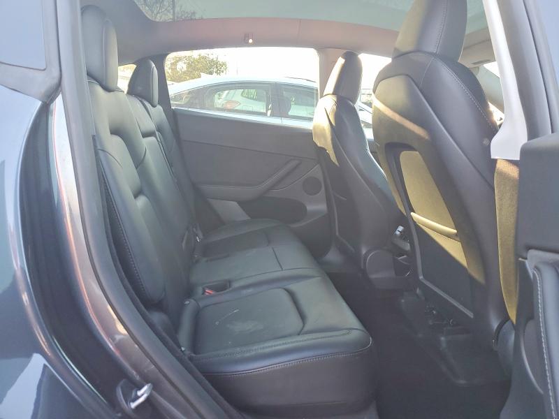 Photo 11 from auction – 2023 TESLA MODEL Y with VIN 7SAYGDEE2PF867442