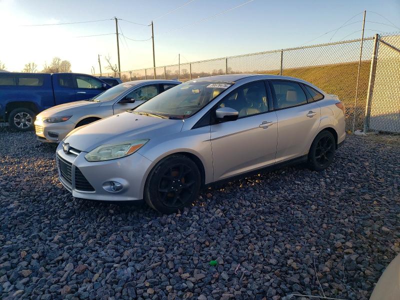 FORD FOCUS SE 2013 with VIN 1FADP3F24DL164868 - Photo from auction
