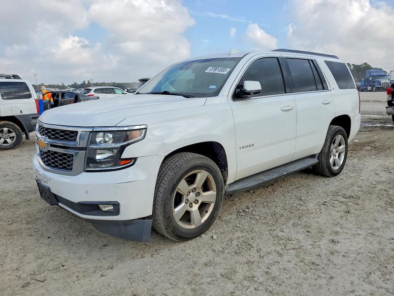 CHEVROLET TAHOE 2015 with VIN 1GNSCBKC5FR706959 - Photo from auction