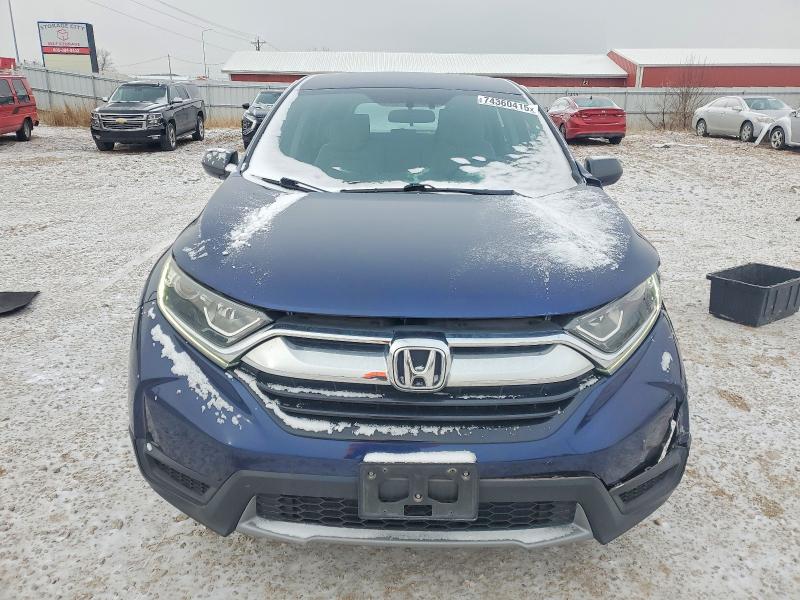 Photo 5 from auction – 2017 HONDA CR-V LX with VIN 2HKRW6H39HH202745
