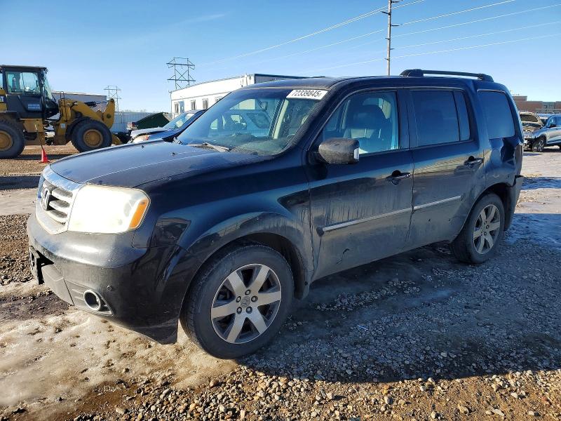 HONDA PILOT TOUR 2014 with VIN 5FNYF4H98EB021196 - Photo from auction