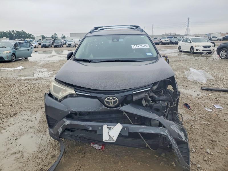 Photo 5 from auction – 2017 TOYOTA RAV4 with VIN JTMZFREV8HJ704886