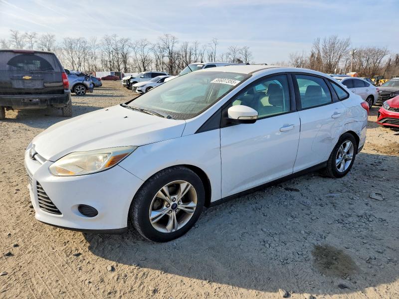 FORD FOCUS SE 2014 with VIN 1FADP3F25EL318554 - Photo from auction