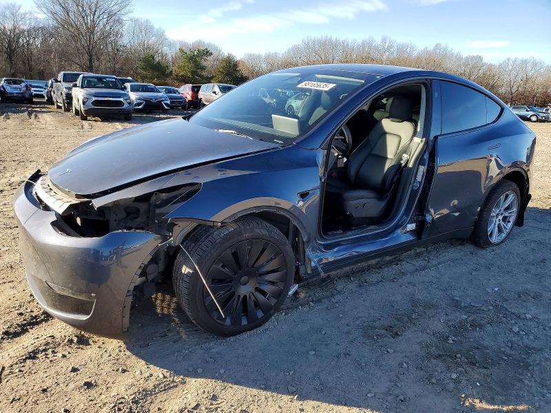 TESLA MODEL Y 2023 مع رقم تعريف المركبة 7SAYGDEE9PA201238 - صورة من المزاد