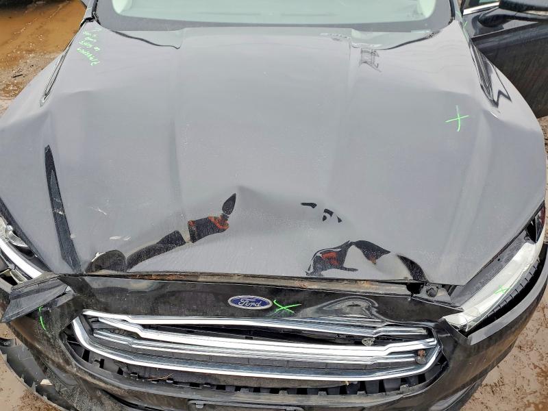 Photo 11 from auction – 2014 FORD FUSION SE with VIN 3FA6P0LU0ER299281