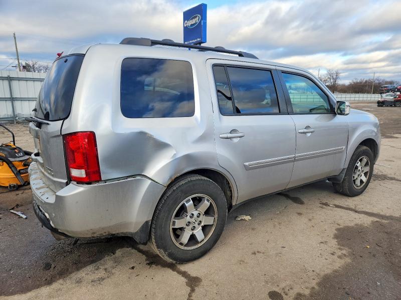 Photo 3 from auction – 2010 HONDA PILOT TOUR with VIN 5FNYF4H99AB026336
