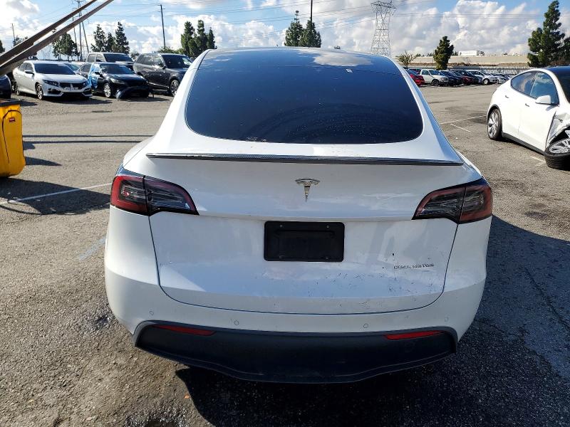 Photo 6 from auction – 2023 TESLA MODEL Y with VIN 7SAYGDEF0PF589567