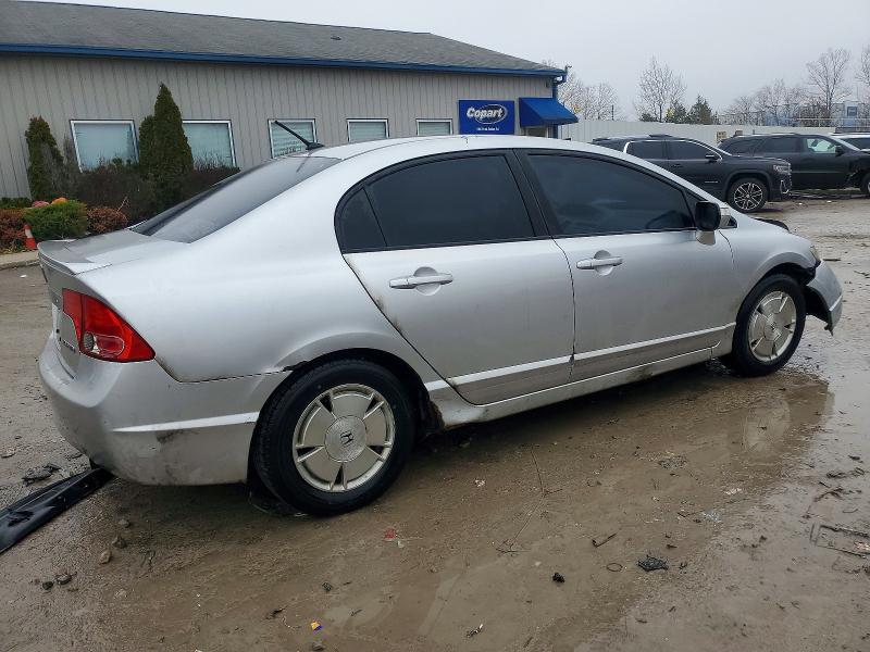 Photo 3 from auction – 2007 HONDA CIVIC HYBR with VIN JHMFA36297S032492